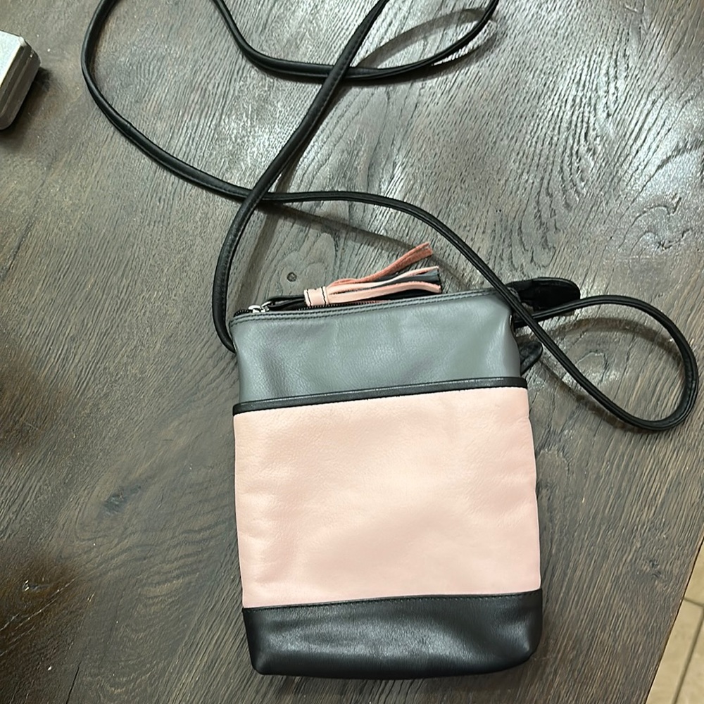 Black, pink & gray ili New York crossbody leather purse.